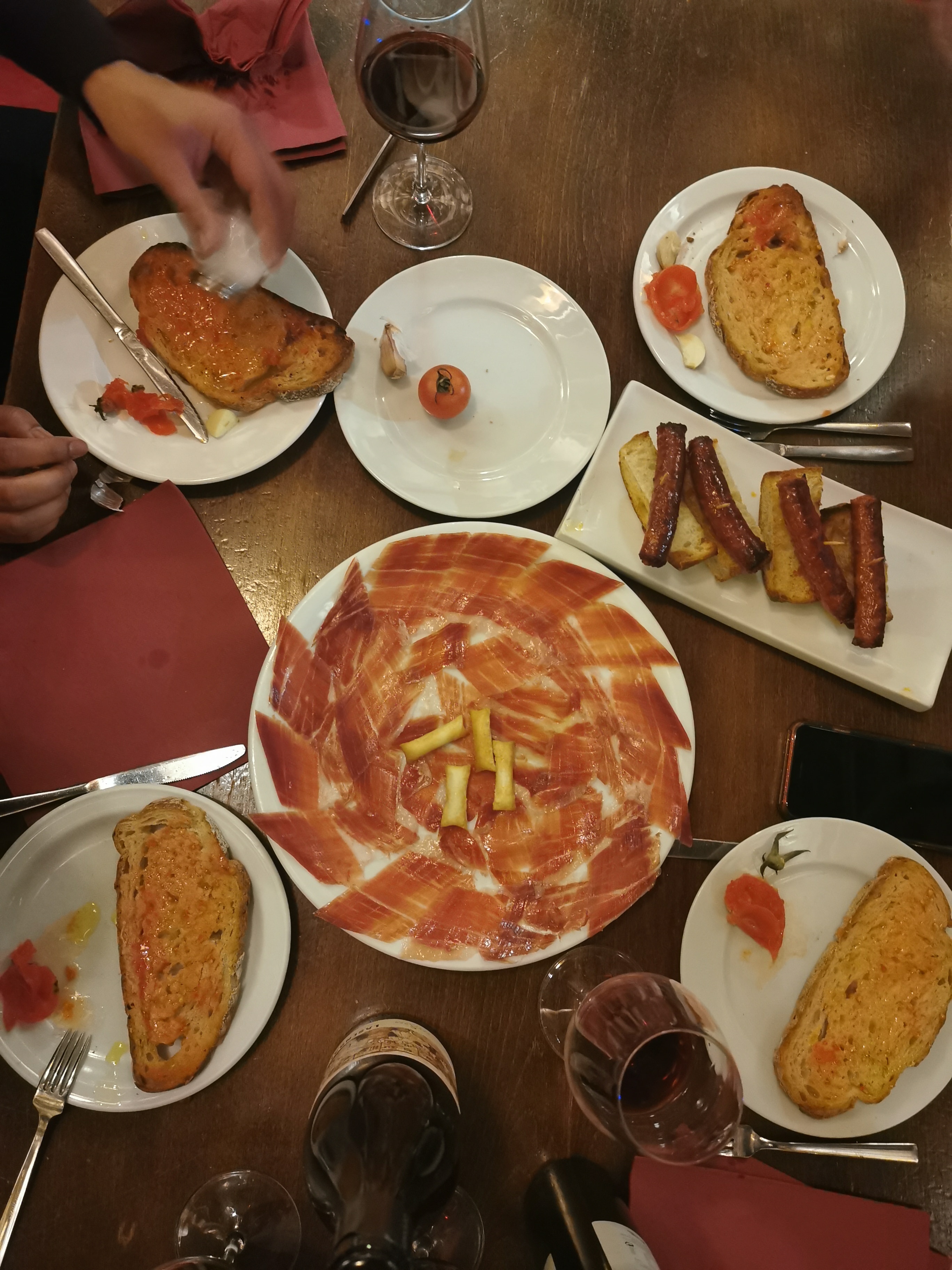 Table of assorted tapas with ham
