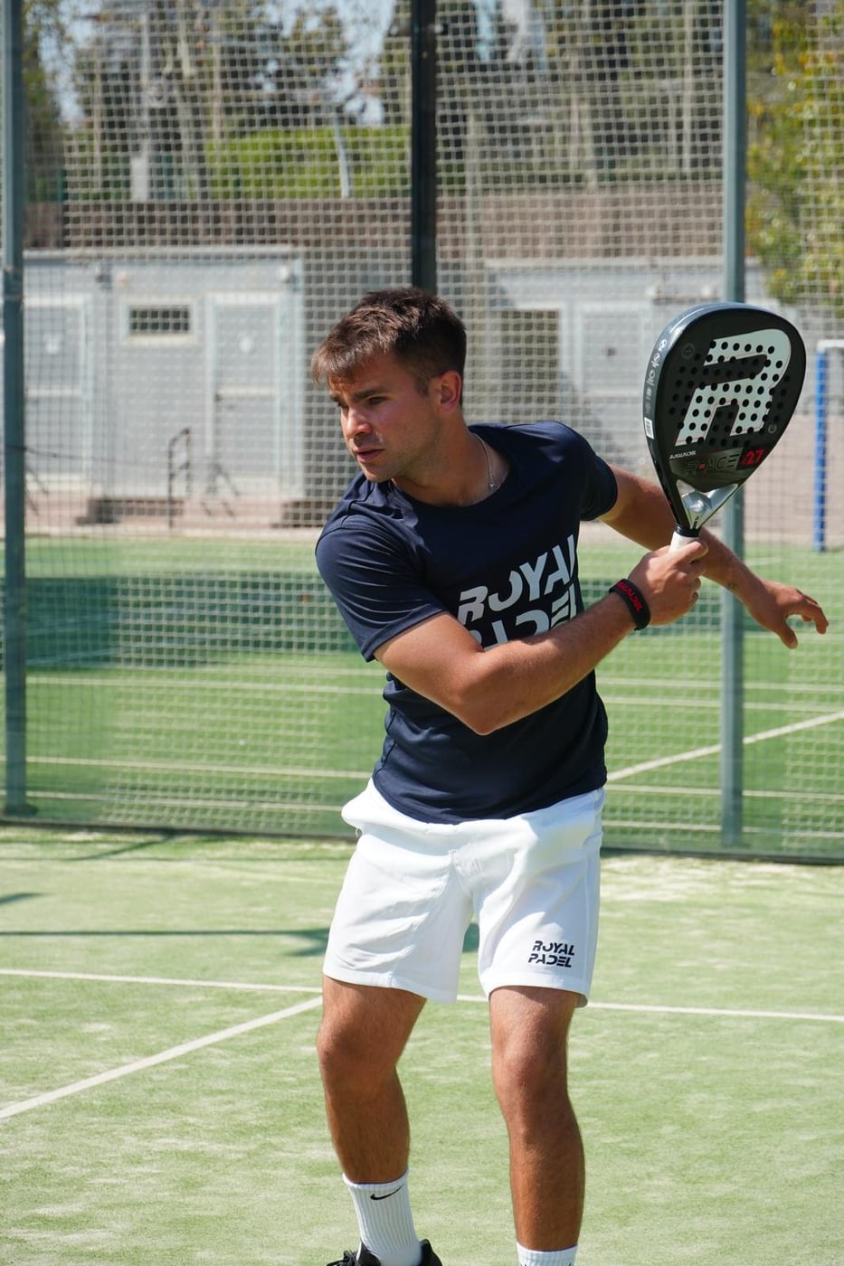 Max, head coach at Barcelona Padel Escapes, playing a backhand on court