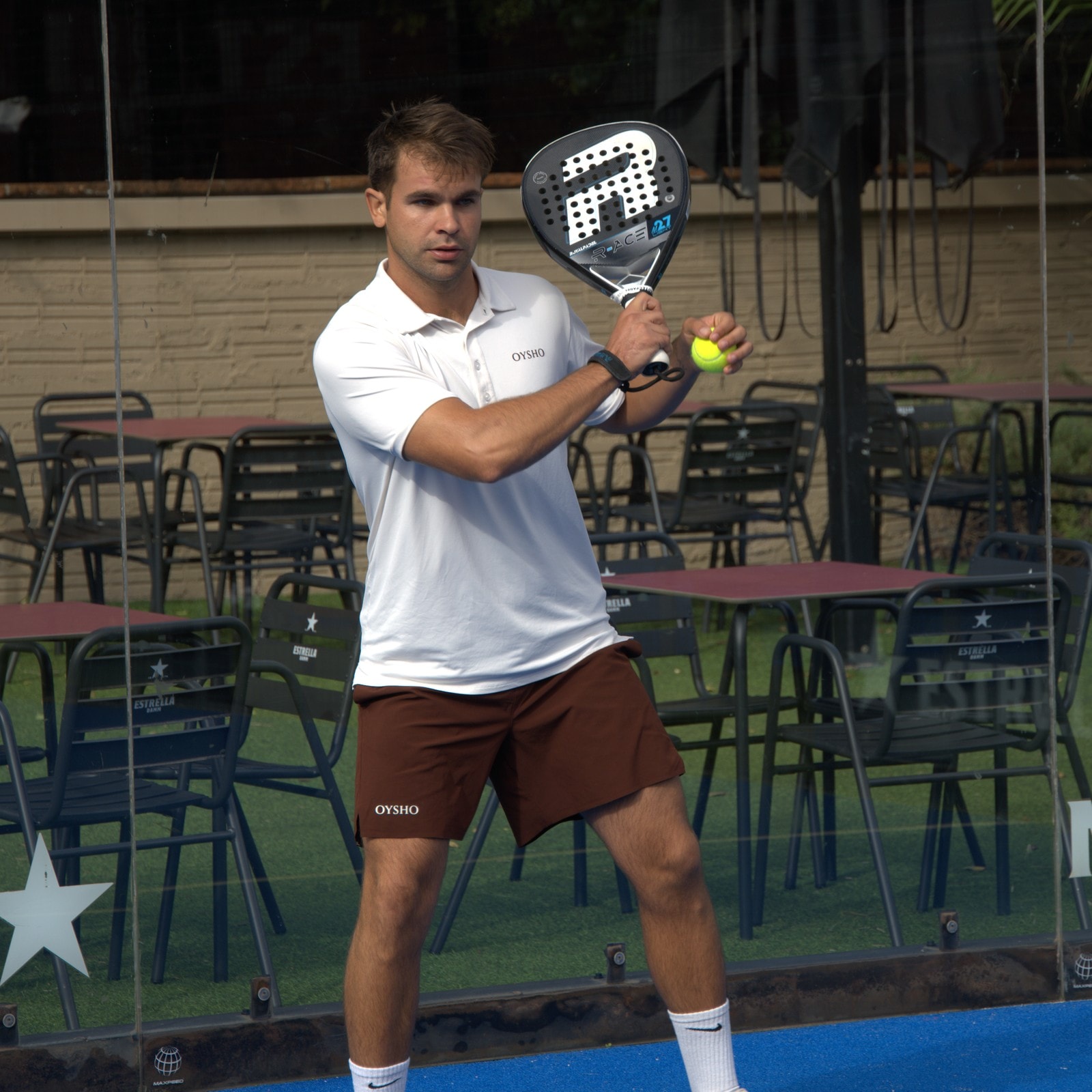 Max, head coach at Barcelona Padel Escapes, hitting a volley at the net